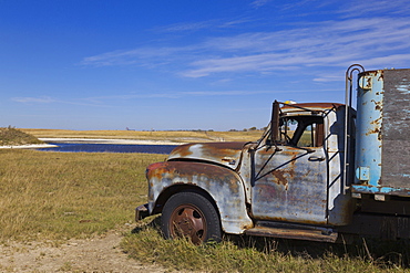 View of old truck on landscape at Highway 20, Saskatchewan, Canada