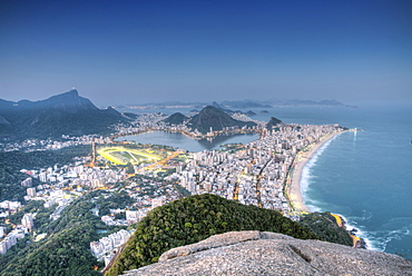 View of Ipanema and Leblon beaches, Corcovado and the Sugar Loaf at twilight, Rio de Janeiro, Brazil, South America