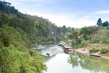 A boat on the River Kwai with the POW-built Wampoo Viaduct behind, Death Railway near Nam Tok, Kanchanaburi, Thailand, Southeast Asia, Asia