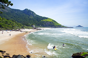 Surfers on Prainha beach, Barra da Tijuca, Rio de Janeiro, Brazil, South America