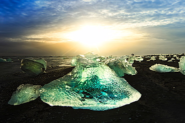 Icebergs on a black sand volcanic beach next to the Jokulsarlon glacial lake in Vatnajokull National Park in southeast Iceland, Polar Regions