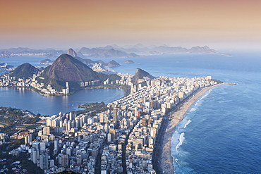 View of Ipanema and Leblon beaches, Corcovado and the Sugar Loaf at twilight, Rio de Janeiro, Brazil, South America