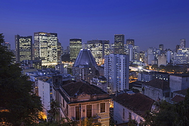 View of the skyscrapers of the city centre and central business district, wiith Santa Teresa in the foreground, Rio de Janeiro, Brazil, South America