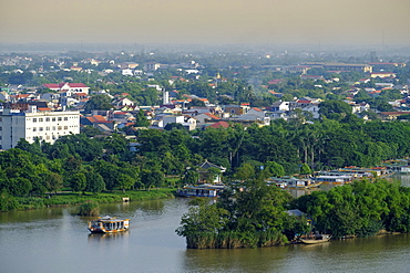 A view of the Perfume River and skyline of the city of Hue, Vietnam, Indochina, Southeast Asia, Asia