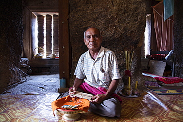 Fortune teller in the interior of an old Khmer temple on Chi Sor Mountain in Takeo, Cambodia, Indochina, Southeast Asia, Asia