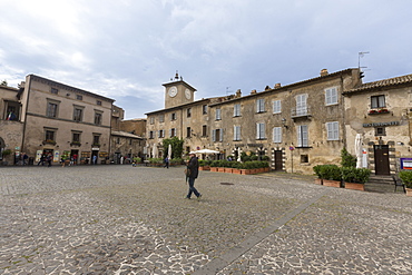 Old buildings and bell tower in the ancient pedestrian square, Orvieto, Terni Province, Umbria, Italy, Europe