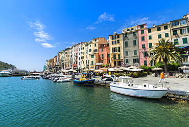 The turquoise sea frames the typical colored houses of Portovenere, UNESCO World Heritage Site, La Spezia province, Liguria, Italy, Europe