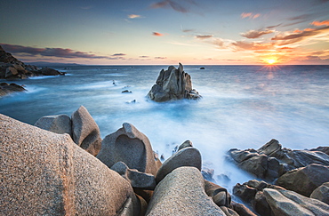 The light of sunset on blue sea framed by cliffs, Capo Testa, Santa Teresa di Gallura, Province of Sassari, Sardinia, Italy, Mediterranean, Europe