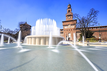 The fountain frames the ancient Sforza Castle, Milan, Lombardy, Italy, Europe