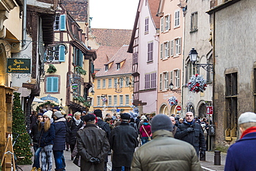 Tourists in the pedestrian road of the old town at Christmas time, Colmar, Haut-Rhin department, Alsace, France, Europe