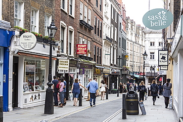 People flock to the shopping streets of Covent Garden, London, England, United Kingdom, Europe