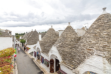 The typical huts called Trulli built with dry stone with a conical roof, Alberobello, UNESCO World Heritage Site, Province of Bari, Apulia, Italy, Europe