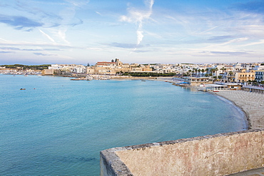 Turquoise sea frames the beach and the medieval old town Otranto, Province of Lecce, Apulia, Italy, Europe