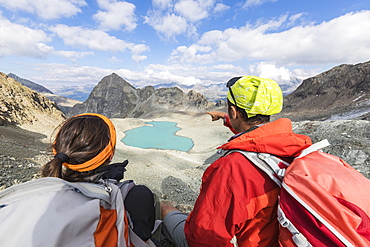 Hikers at Lej Lagrev during summer, Silvaplana, Engadine, Canton of Graubunden, Switzerland, Europe