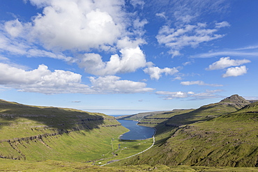 Cliffs and sea at Kollafjorour fjord, Streymoy Island, Faroe Islands, Denmark, Europe