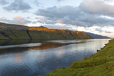 Sunset on fjord and sea, Eidi, Eysturoy Island, Faroe Islands, Denmark, Europe