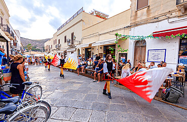 Parade of traditional costumes and flags, Favignana island, Aegadian Islands, province of Trapani, Sicily, Italy, Europe