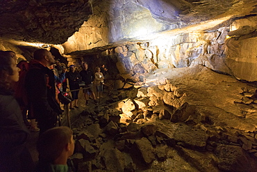 Tourists inside Aillwee Cave, The Burren, County Clare, Munster, Republic of Ireland, Europe