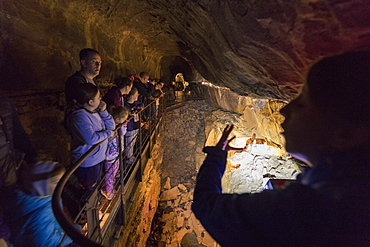 Tourists inside Aillwee Cave, The Burren, County Clare, Munster, Republic of Ireland, Europe