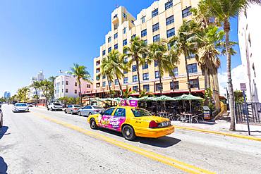 Yellow taxi cab, Ocean Drive, Miami Beach, Florida, United States of America, North America