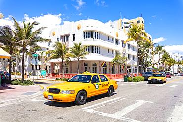 Yellow taxi cab, Ocean Drive, Miami Beach, Florida, United States of America, North America