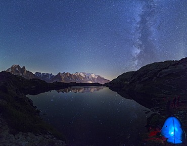 Camping under the stars at Lac des Cheserys, with the range of Mont Blanc in the background, Haute Savoie. French Alps, France, Europe