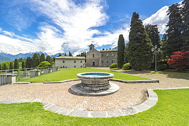 Gardens and facade of Piona Abbey (Abbazia Priorato di Piona), Colico, Lecco province, Lombardy, Italy, Europe