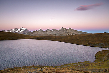 Sunset on Rosset Lake at an altitude of 2709 meters, Gran Paradiso National Park, Alpi Graie (Graian Alps), Italy, Europe