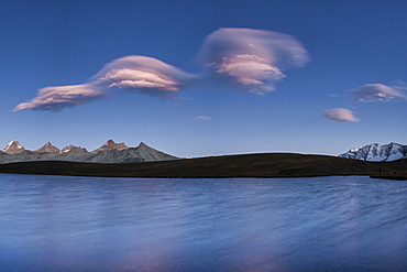 Pink clouds after sunset on Rosset Lake at an altitude of 2709 meters, Gran Paradiso National Park, Alpi Graie (Graian Alps), Italy, Europe