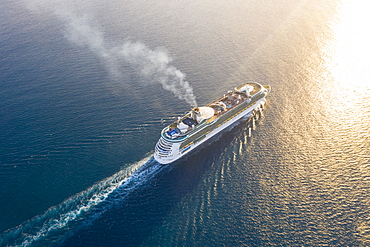 Cruise ship sailing in the Caribbean Sea at sunset, aerial view by drone, Antilles, West Indies, Caribbean, Central America