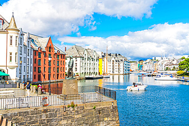 Fiskergutten (Fisher boy) statue on Brosundet Canal waterfront, Alesund, More og Romsdal county, Norway, Scandinavia, Europe