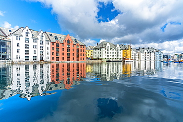 Art Nouveau styled houses mirrored in Brosundet canal, Alesund, More og Romsdal county, Norway, Scandinavia, Europe