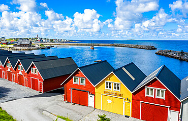 Traditional wood houses waterfront along the fjord, Alnes, Godoya Island, Alesund, More og Romsdal County, Norway, Scandinavia, Europe