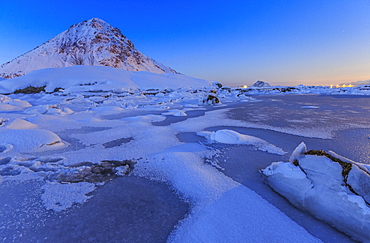 Reflections of full moon in the frozen sea, Lyngedal, Lofoten Islands, Arctic, Norway, Scandinavia, Europe