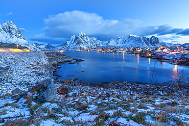 Blue of dusk dominates the scenery in Reine, Lofoten Islands, Arctic, Norway, Scandinavia, Europe