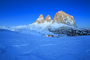 The blue dusk on Sassopiatto and Sassolungo, Fassa Valley, Sella Pass, Trentino-Alto Adige, Dolomites, Italy, Europe