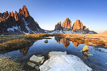 Dawn illuminates the Three peaks of Lavaredo and Mount Paterno, Sesto, Dolomites, Trentino-Alto Adige, Italy, Europe