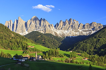 The village of St. Magdalene surrounded by green meadows at the foot of the Odle, Funes Valley, South Tyrol, Dolomites, Italy, Europe