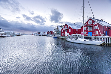 The typical fishing village of Henningsvaer with its red houses (rorbu), Lofoten Islands, Arctic, Northern Norway, Scandinavia, Europe