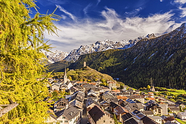 View of Ardez village surrounded by woods and snowy peaks Lower Engadine, Canton of Graubunden, Switzerland, Europe