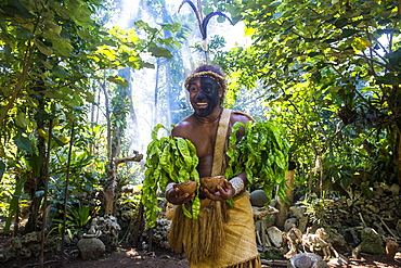 Traditional dressed man in the jungle, Ekasup Cultural Village, Efate, Vanuatu, Pacific