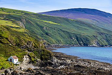 Little cottage on the coast of Isle of Man, crown dependency of the United Kingdom, Europe