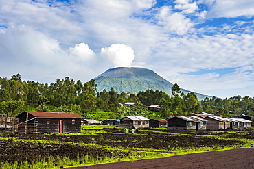 Mount Nyiragongo looming behind the town of Goma, Democratic Republic of the Congo, Africa