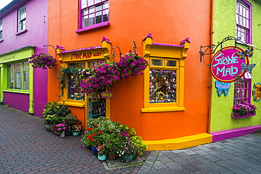 Brightly coloured shops in Kinsale, County Cork, Munster, Republic of Ireland, Europe