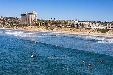 Surfers waiting in the waters of La Jolla for the next big wave, California, United States of America, North America