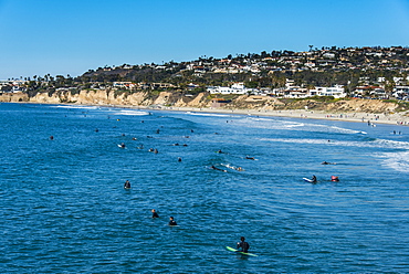 Surfers waiting in the waters of La Jolla for the next big wave, California, United States of America, North America