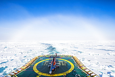 Fog bow or white rainbow in the ice around the North Pole, Arctic