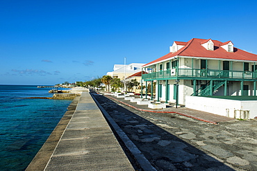 View of the beachfront with the colonial houses of Cockburn Town, Grand Turk, Turks and Caicos, Caribbean, Central America