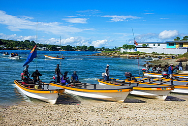 Banana boats transporting locals from Buka to Bougainville, Papua New Guinea, Pacific