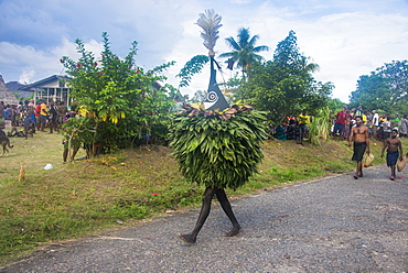 Traditional masked man at a Taboo death ceremony, East New Britain, Papua New Guinea, Pacific